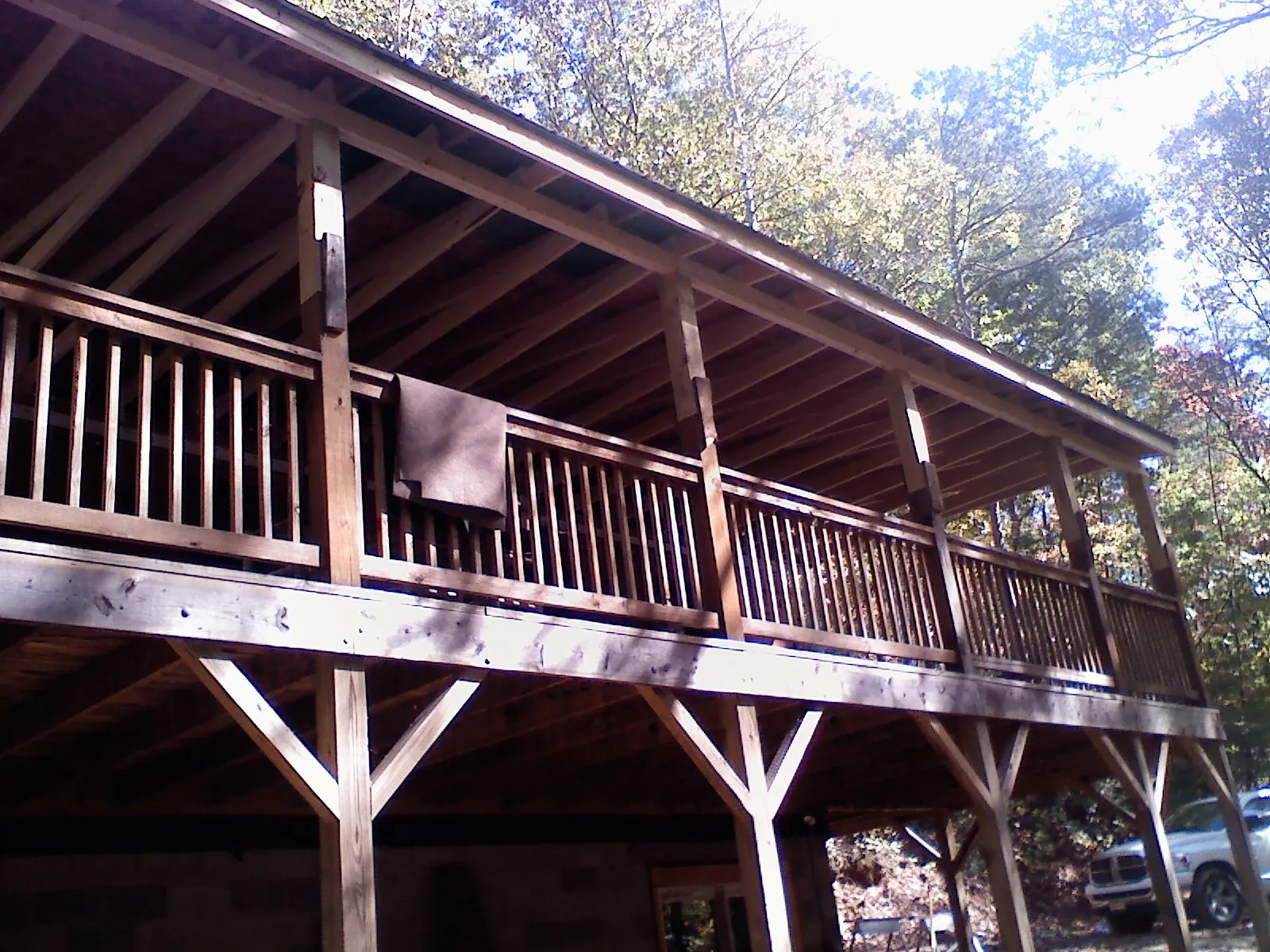 Timber framing under a new elevated porch and deck — Roof Leak Repair in Haslet by Roofing Brothers